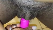 Masturbating her wet pussy in the bathroom