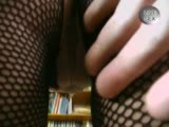 Horny girl in fishnet outfit - Venality Productions